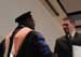 Dr. Darrin Thorton congratulating 2012 Phi Kappa Phi initiate #13.